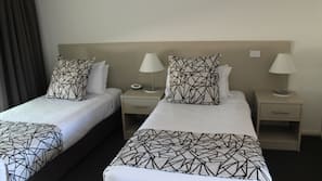 In-room safe, blackout curtains, iron/ironing board, cots/infant beds