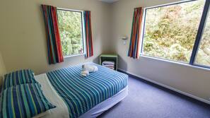 Blackout curtains, iron/ironing board, free WiFi, linens