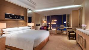 Premium bedding, down comforters, minibar, in-room safe