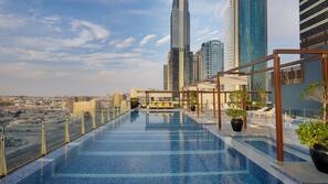 Outdoor pool, pool umbrellas, pool loungers