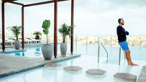 Outdoor pool, pool umbrellas, pool loungers