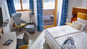 Luxe beddengoed, een kluis op de kamer, een bureau
