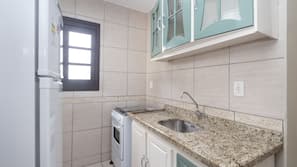 Fridge, oven, hob, cookware/dishes/utensils