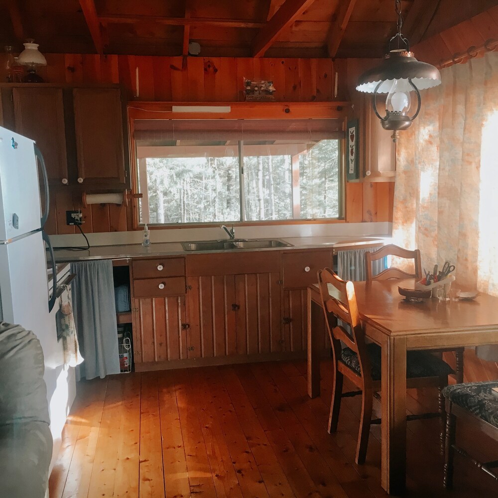 Rustic Cabin on Ambajejus Lake With Sandy Beach and a Mountain View in