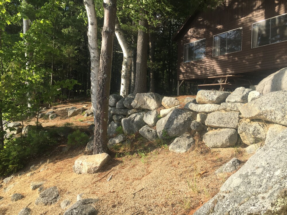 Rustic Cabin on Ambajejus Lake With Sandy Beach and a Mountain View in