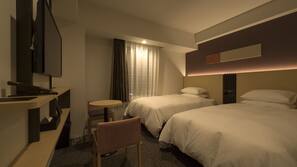 Down comforters, laptop workspace, blackout drapes, iron/ironing board