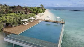3 outdoor pools, open 8:00 AM to 6:00 PM, free cabanas, pool umbrellas