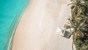 Private beach, white sand, free beach cabanas, sun loungers