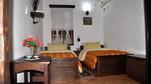Premium bedding, individually furnished, desk, laptop workspace