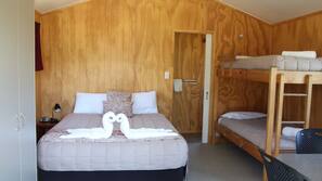 Blackout curtains, iron/ironing board, free WiFi, linens