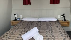 Blackout curtains, iron/ironing board, free WiFi, linens