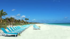Private beach, white sand, sun loungers, beach towels