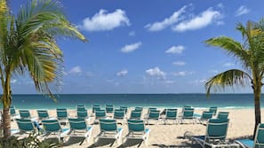 Private beach, white sand, sun loungers, beach towels