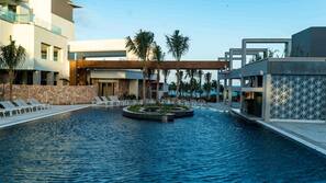2 outdoor pools, open 8:00 AM to 8:00 PM, pool umbrellas, sun loungers