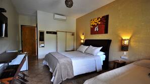 Minibar, desk, bed sheets