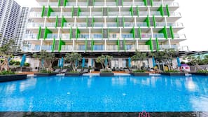 Outdoor pool, open 8:00 AM to 8:00 PM, pool umbrellas, pool loungers