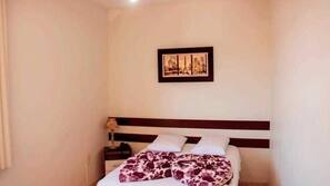 Minibar, blackout curtains, iron/ironing board, free WiFi