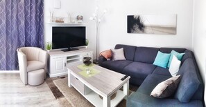 Marina Müritz Apartment | Living area | 40-inch TV with satellite channels