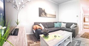 Marina Müritz Apartment | Living area | 40-inch TV with satellite channels