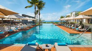 Outdoor pool, pool umbrellas, sun loungers