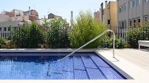 Indoor pool, outdoor pool, open 9:00 AM to 9:00 PM, pool loungers