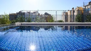 Indoor pool, outdoor pool, open 9:00 AM to 9:00 PM, pool loungers
