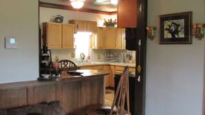Microwave, dishwasher, coffee/tea maker, cookware/dishes/utensils