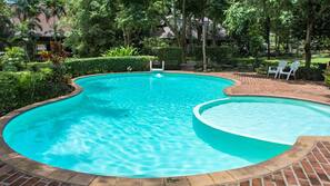 Outdoor pool, pool umbrellas, sun loungers
