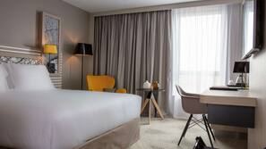 Minibar, desk, blackout curtains, iron/ironing board