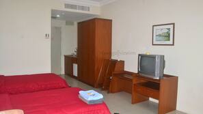 Blackout curtains, iron/ironing board, free WiFi, linens