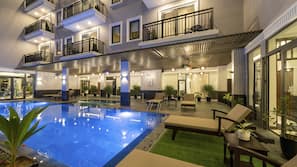 Outdoor pool, open 6:00 AM to 10:00 PM, sun loungers