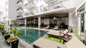Outdoor pool, open 6:00 AM to 10:00 PM, sun loungers