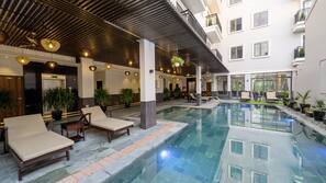 Outdoor pool, open 6:00 AM to 10:00 PM, sun loungers