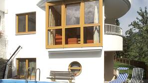 Seasonal outdoor pool, pool umbrellas, pool loungers