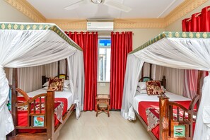 Family Apartment, Balcony, City View | Egyptian cotton sheets, premium bedding, in-room safe, blackout drapes