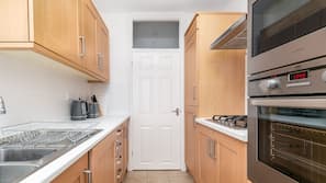 Fridge, microwave, oven, hob