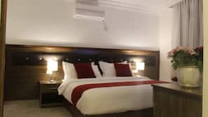 Hypo-allergenic bedding, free minibar, in-room safe, desk