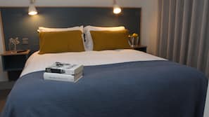 Premium bedding, blackout drapes, iron/ironing board, free WiFi