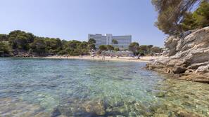 On the beach, white sand