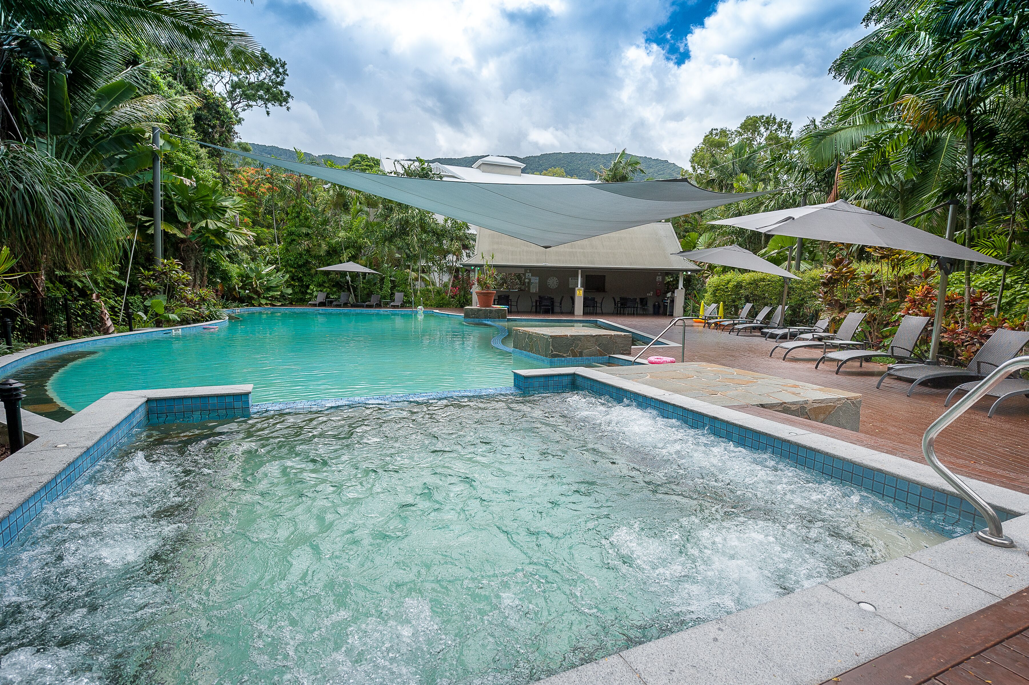 Large  self contained 3 bedroom apartments set in  2.5 acres of tropical gardens