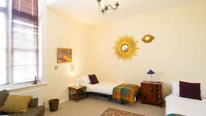 Desk, laptop workspace, iron/ironing board, free cots/infant beds