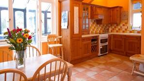 Full-sized fridge, oven, hob, dishwasher
