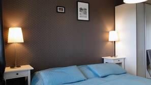 Laptop workspace, blackout drapes, soundproofing, iron/ironing board