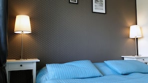Laptop workspace, blackout drapes, soundproofing, iron/ironing board