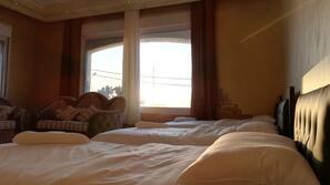 Premium bedding, down comforters, soundproofing, free WiFi