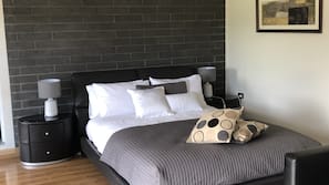 Desk, blackout curtains, soundproofing, iron/ironing board