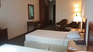 Desk, blackout curtains, iron/ironing board, linens