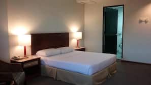 Desk, blackout curtains, iron/ironing board, linens