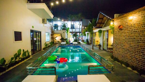 Outdoor pool, open 8:00 AM to 9:30 PM, free cabanas, pool umbrellas