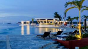 Outdoor pool, open 7:00 AM to 8:00 PM, pool loungers